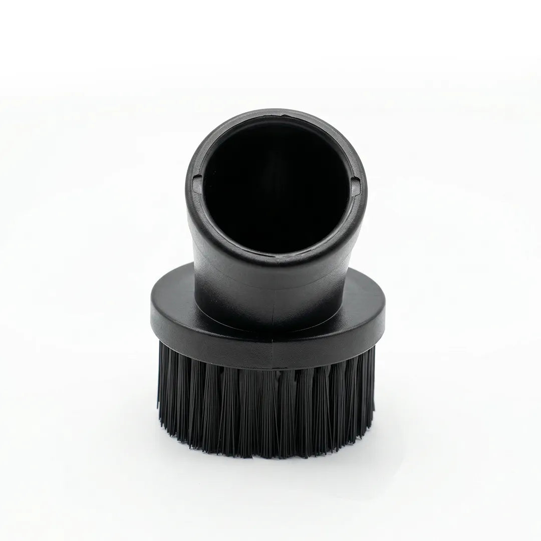 Top-down angled view into the connection port of a black maxx pro vac accessory round brush.