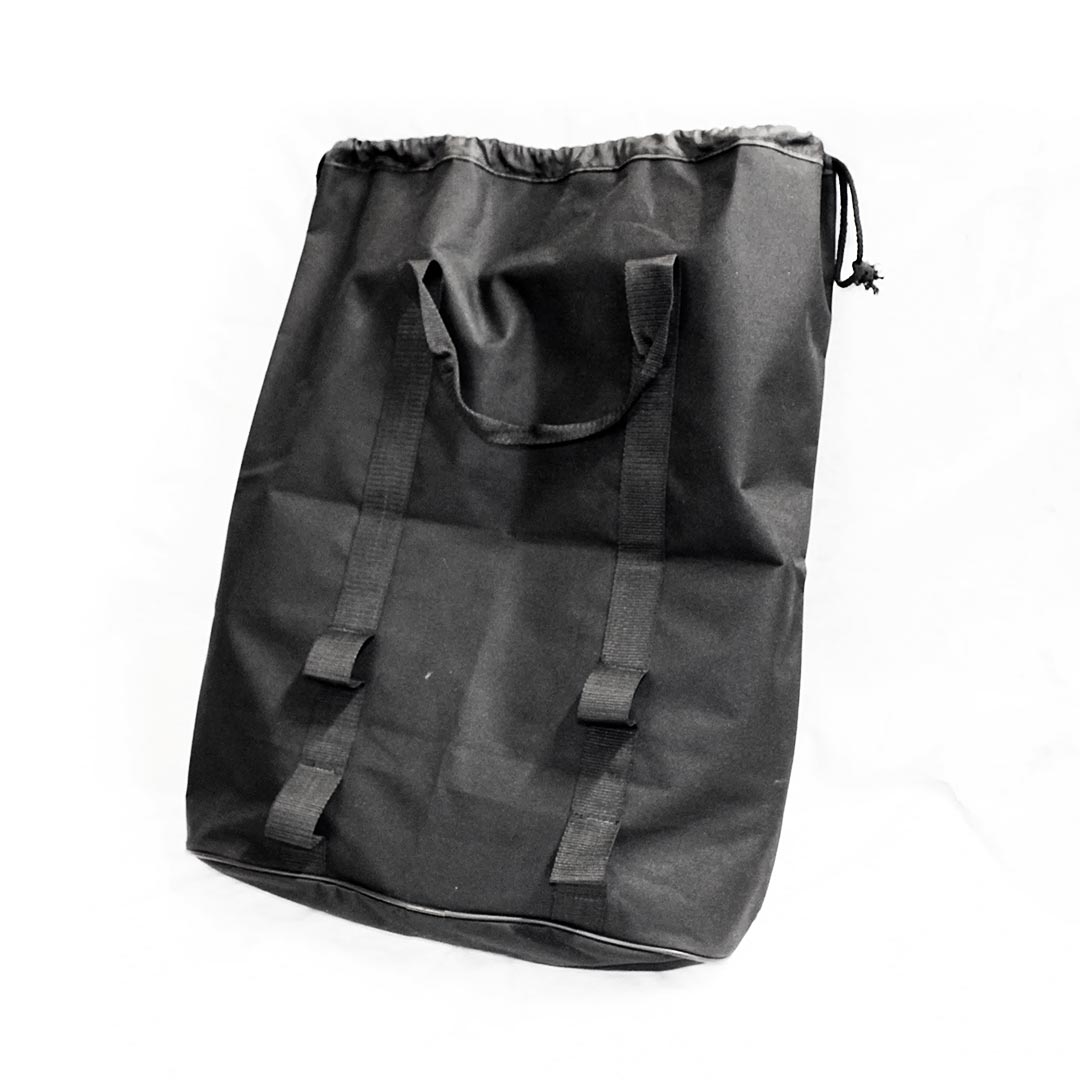 Full vertical view of the black carry bag’s back with dual handles and external straps.